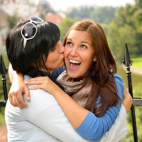 Mother Kissing Daughter